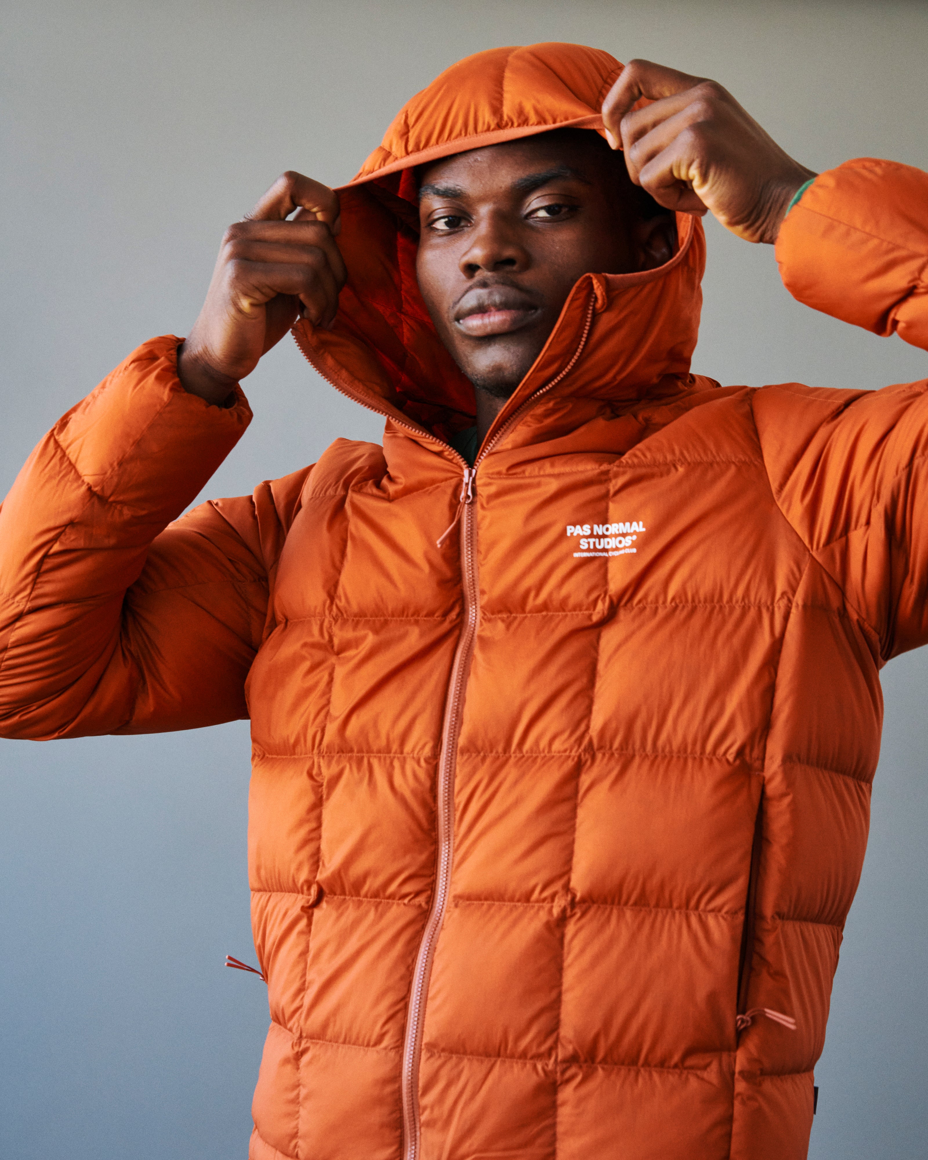 PNS Off-Race Down Jacket Copper Orange - Image 5